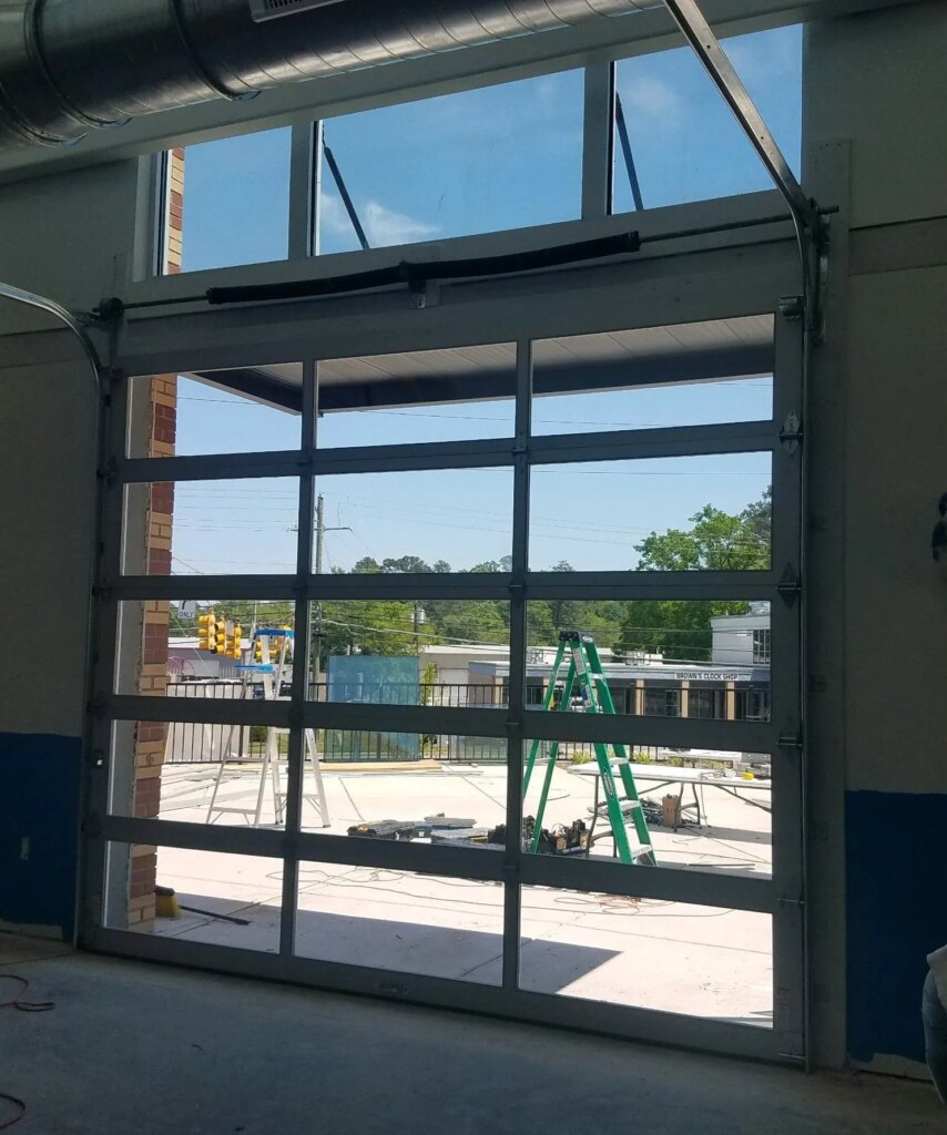 Interior view of full view glass commercial garage door in Raleigh, NC