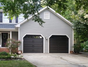 black long raised panel garage doors