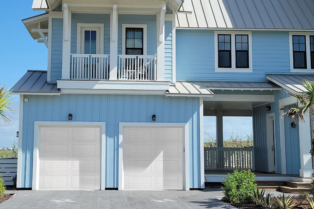 White louvered panel garage door