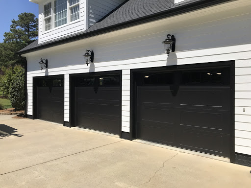 black long recessed panel garage door