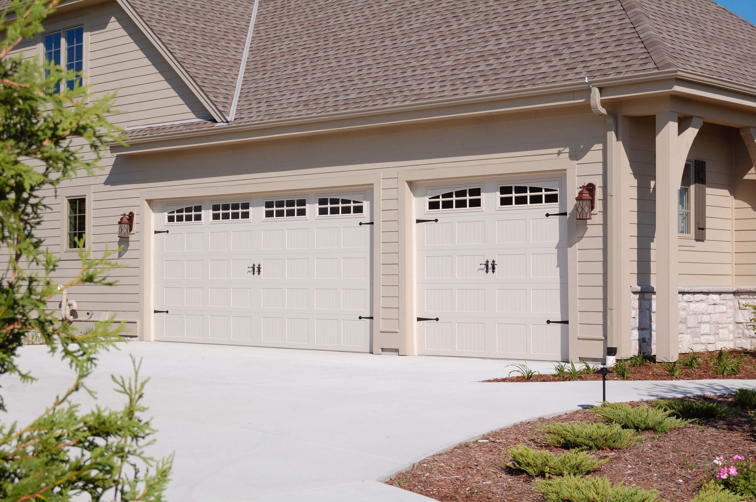 Stamped Carriage panel garage door scaled