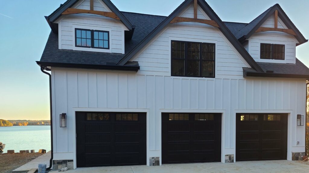 3 Black stamped carriage doors with madison glass