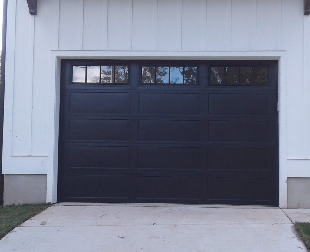 Black Long Recessed Panel Garage Door