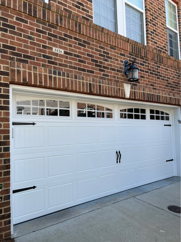 Carriage panel with Arched glass decorative hardware