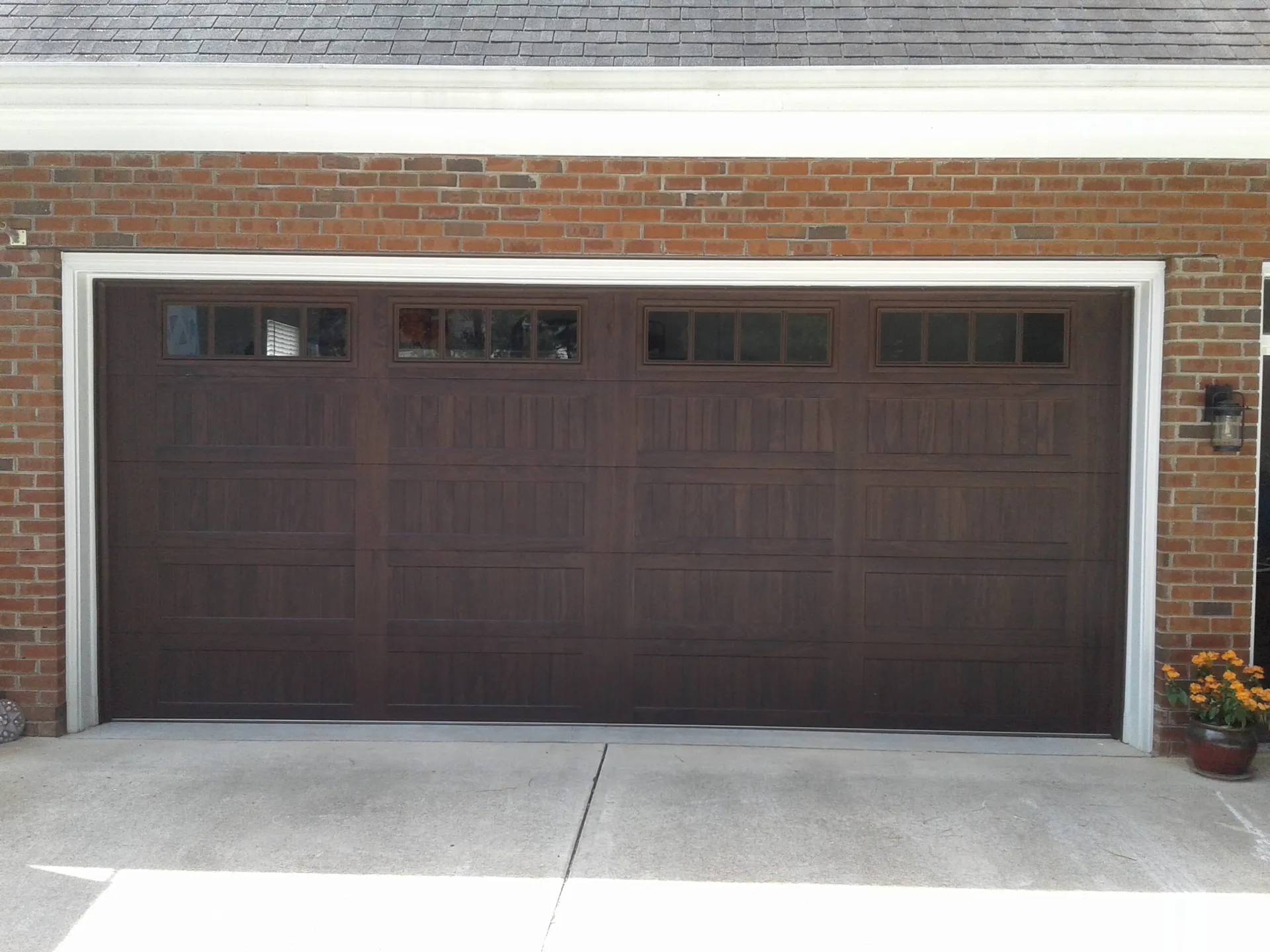 Garage Door Specialist CHI woodtone with Madison glass scaled